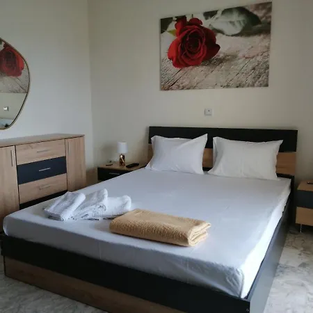 Hara's A Lägenhet Flogita